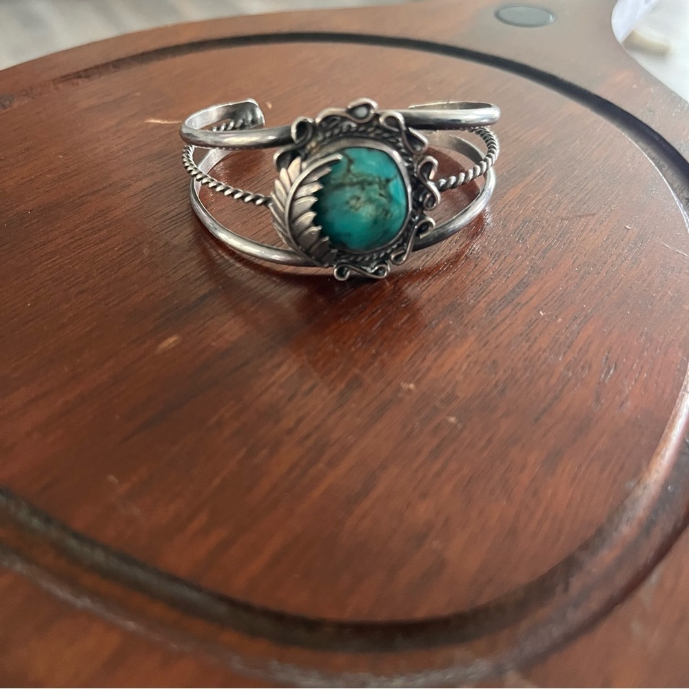 Silver and Blue Cuff Bracelet with Intricate Design